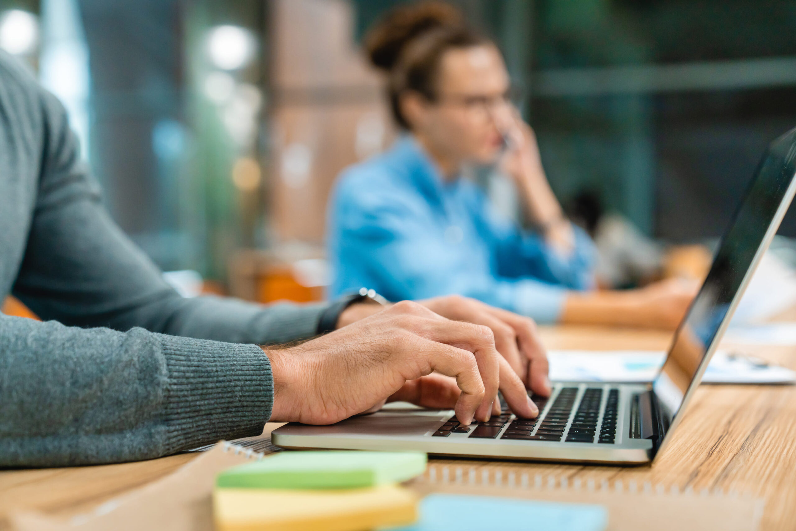 close-up-shot-of-office-desk-with-laptop-and-noteb-2023-11-27-05-06-06-utc (1) (1)