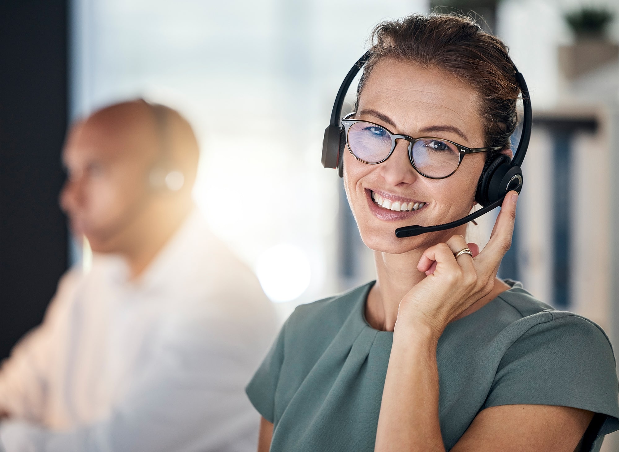 GE_Industries_Professional Services_call-center-telemarketing-and-employee-with-smile-2022-12-22-19-29-57-utc-min